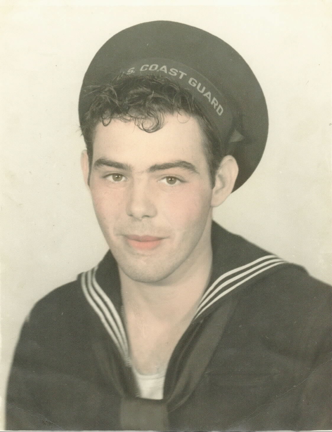 Formal posed photograph of Maurice Poulin in his dress blues uniform during World War II. (Courtesy of the Poulin family) Formal posed photograph of Maurice Poulin in his dress blues uniform during World War II. (Courtesy of the Poulin family)